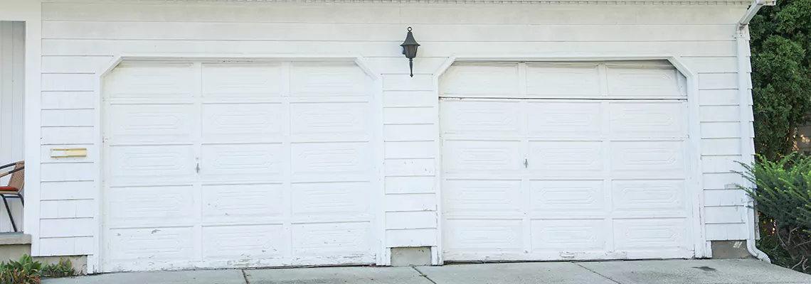 Roller Garage Door Dropped Down Replacement in Dunedin, FL