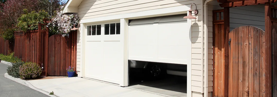 Fix Metal Garage Door Jerking in Dunedin, Florida